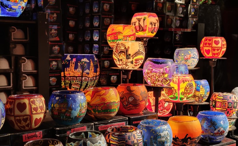 Candle holders decorated in colourful patterns